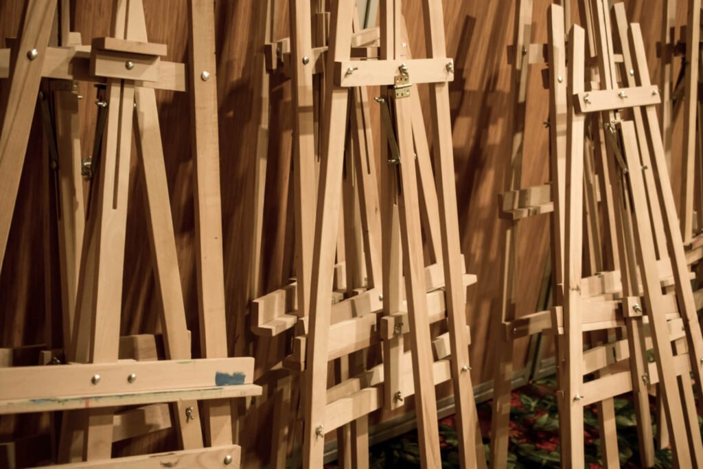 Dozens of wooden easels 